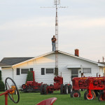 Jon Miller taking overhead pictures of the collection